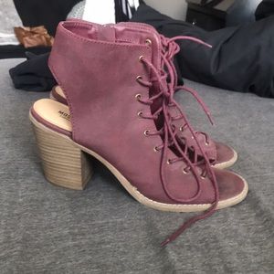 Maroon heals with lace up in front.